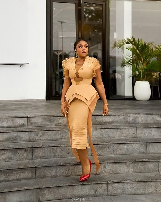A BAEJ customer wearing her piece